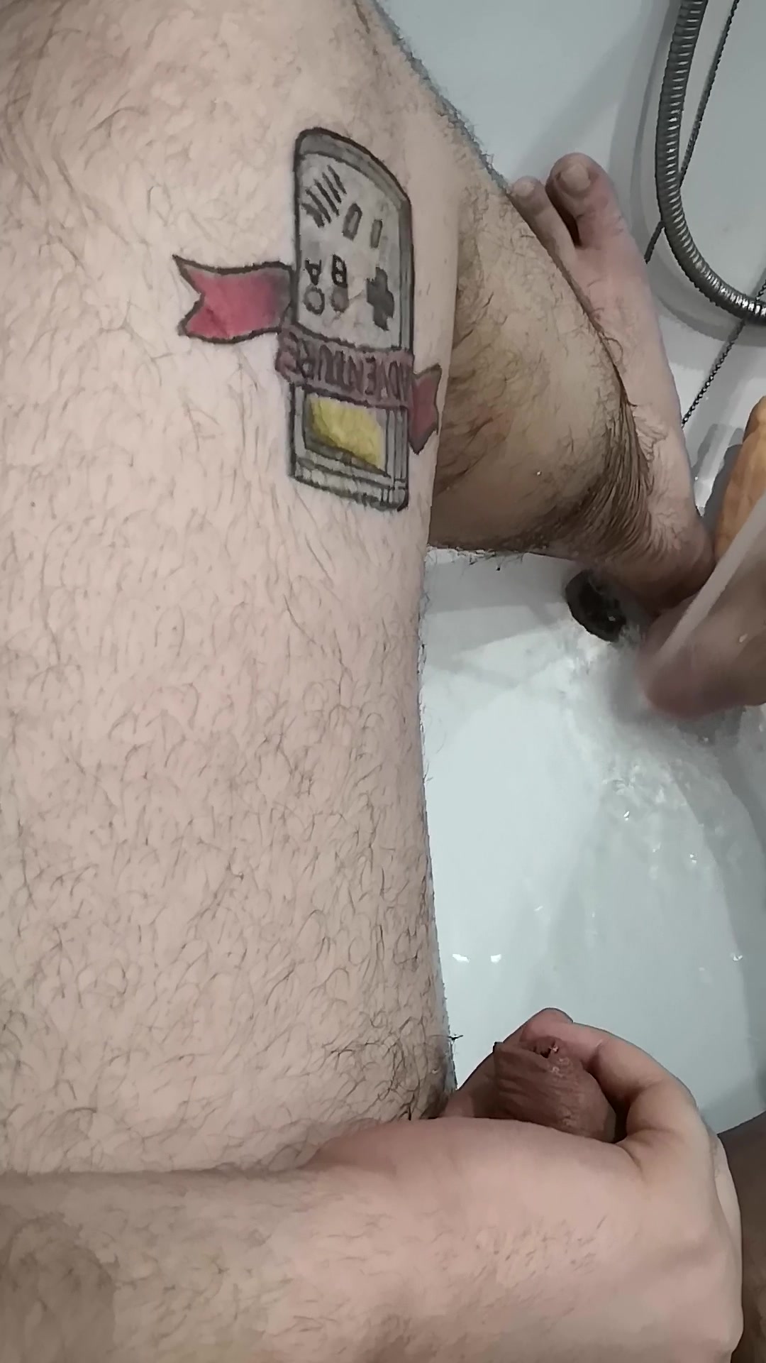 tattooed cub touches his soft dick an piss in the bathroom after cum PART 2