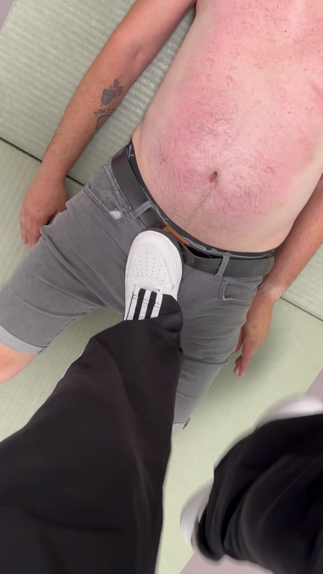 Trampling on slaves cock and balls