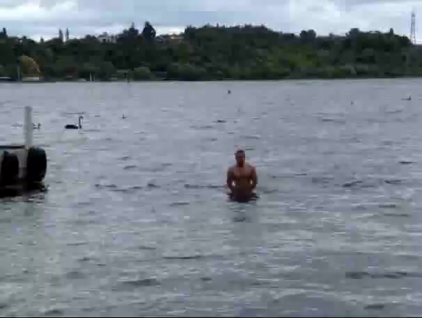 Skinny dipper has towel taken (no frontal)