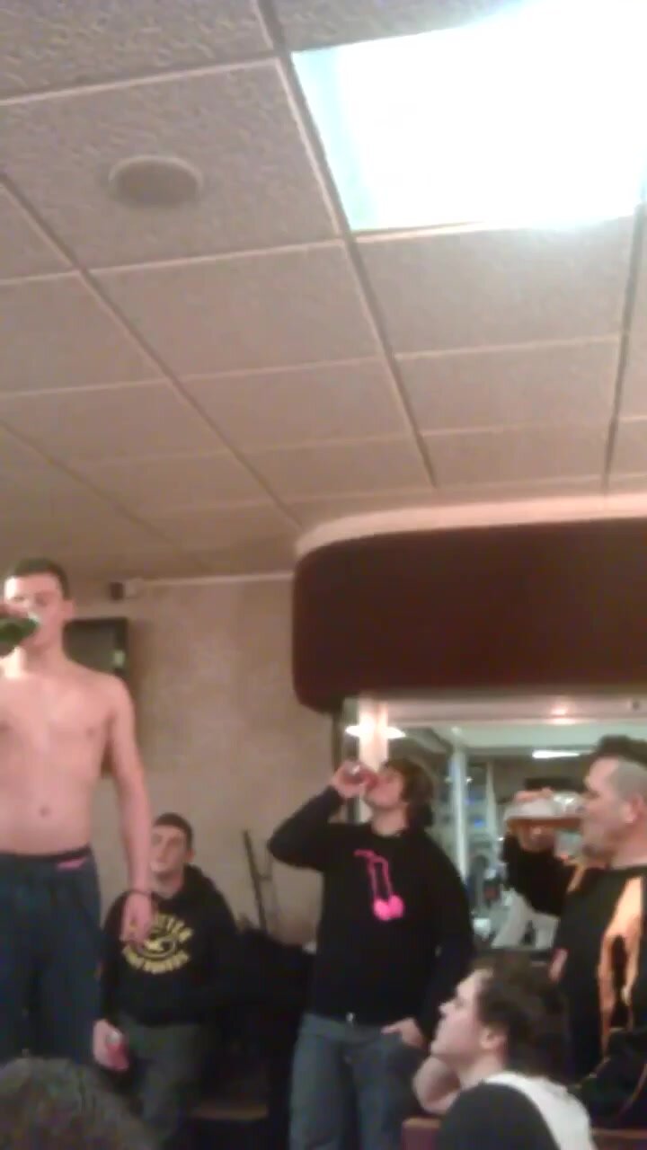 Rugby guy pantsed during initiation (frontal)