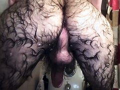 Very hairy stud taking shower