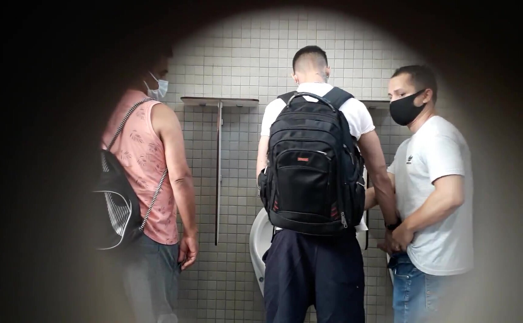 Group cruising in public toilet - video 2