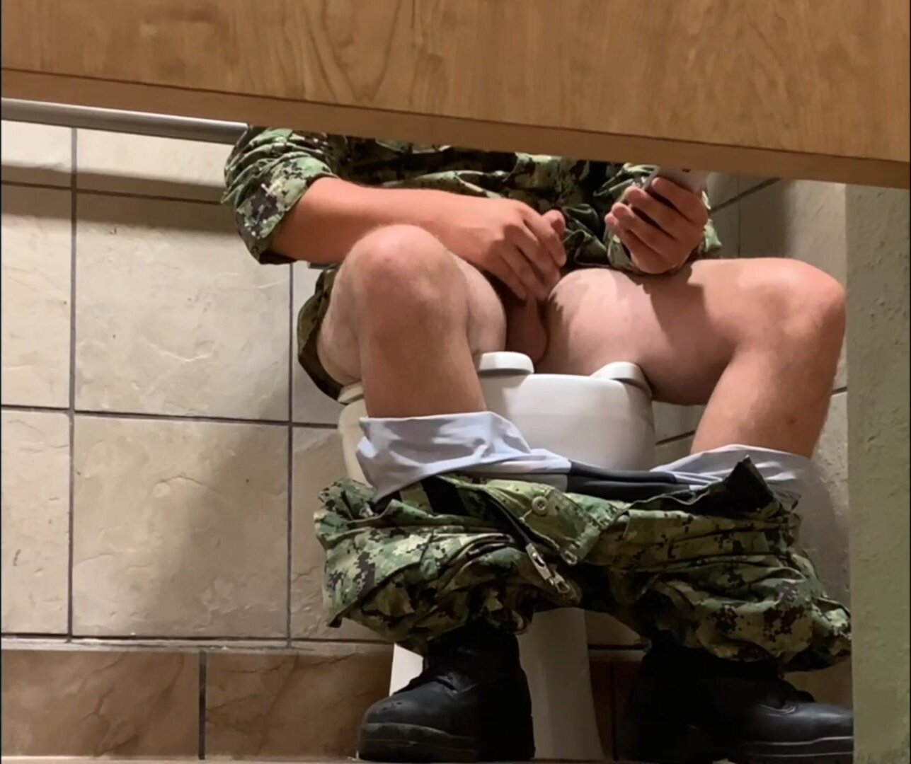 Military guy jerking with his uniform on