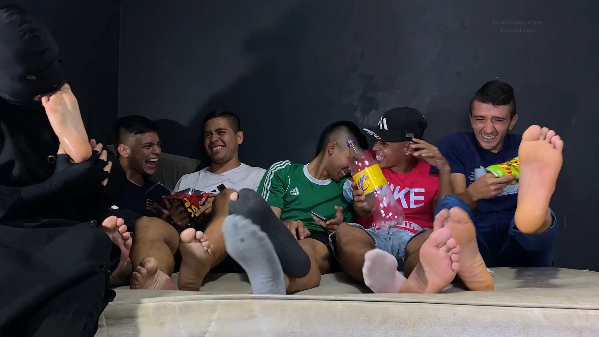 5 soccer players have their feet licked, one by one