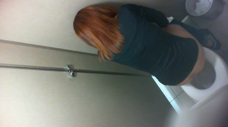 Chinese girl taking poop in the toilet
