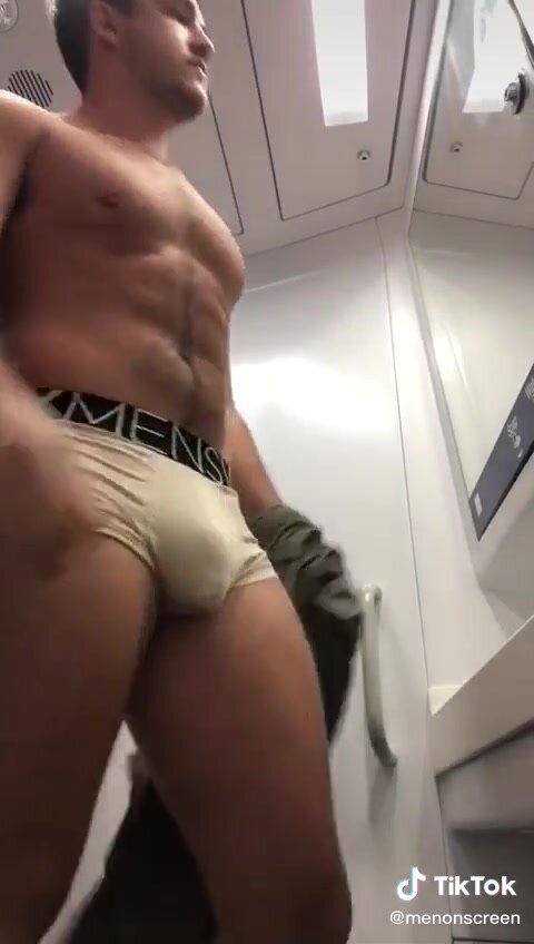 showing off bulge in trunks
