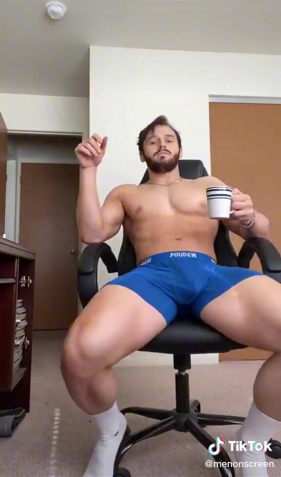 showing off bulge in blue boxerbriefs