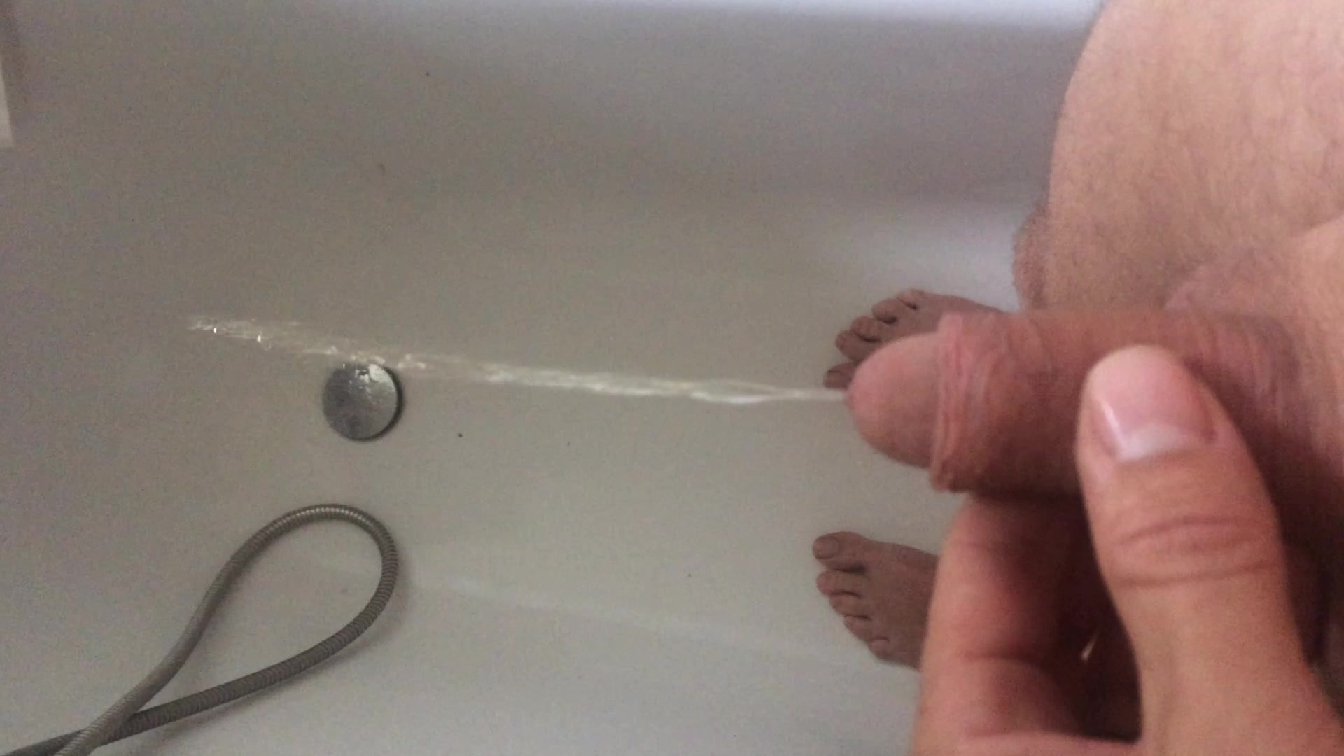 pissing in tub