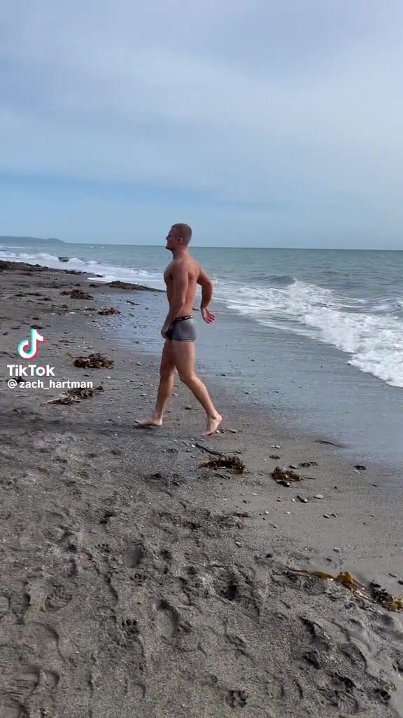 fit guy on a beach