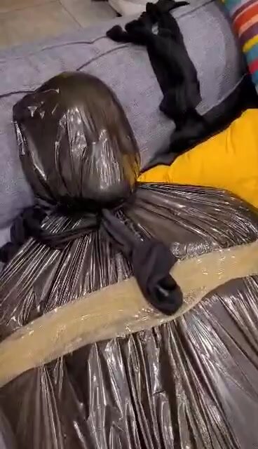 Me bagging and mummified in trashbag