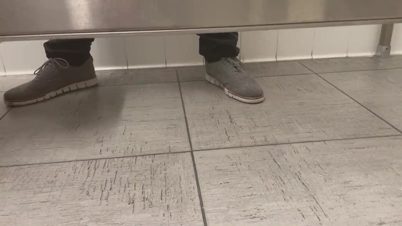 spy male under stall
