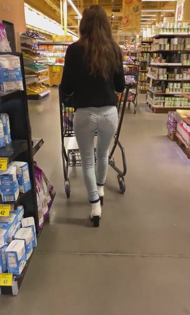 Wetting herself in busy supermarket