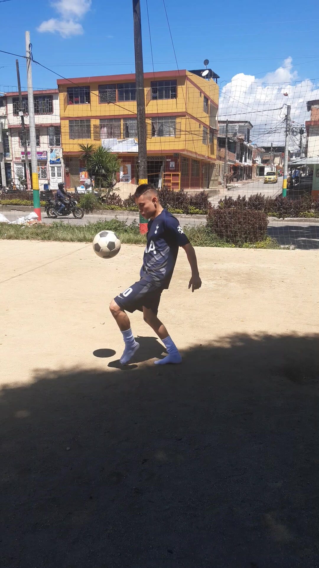 footballer plays in socks