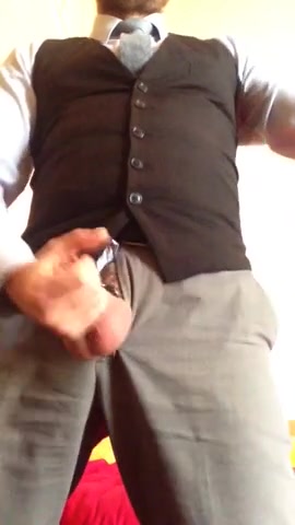 Man in a Suit Jerks Off