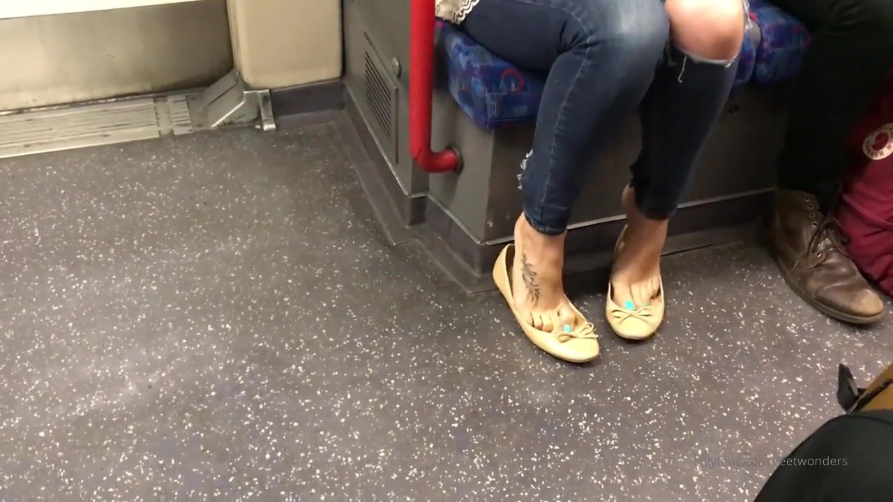 Candid feet in train station gets worshiped by stranger