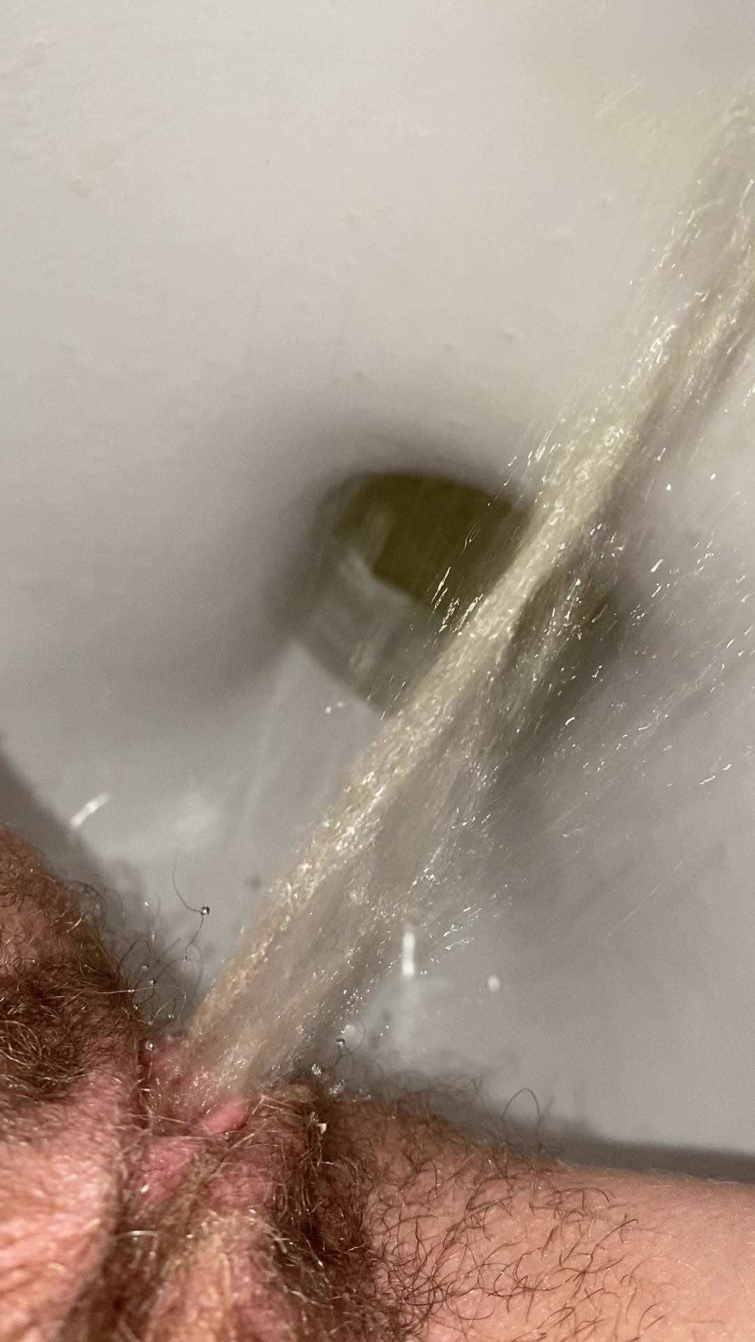 Hairy pussy pissing and shitting