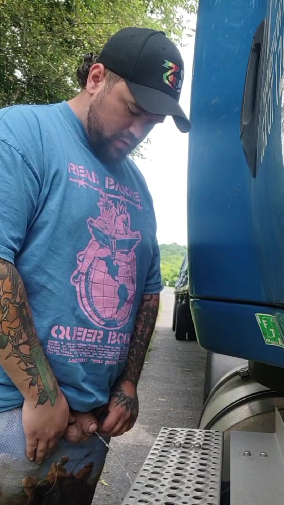Cute bearded trucker pisses outside