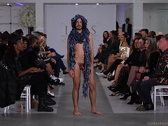 Frontal naked male model in accessories fashion show