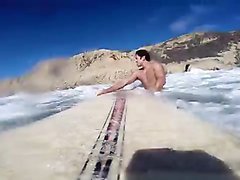 Naked surfer