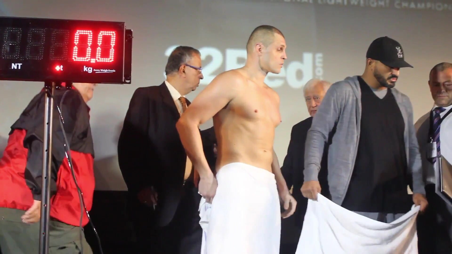 Cheeky cock flash at the weigh-in