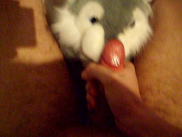 Cumming on a husky plush