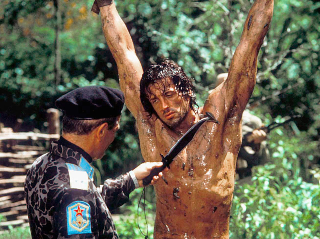 The Hero - Rambo surrenders to ..., torture, crucifixion, and slavery.