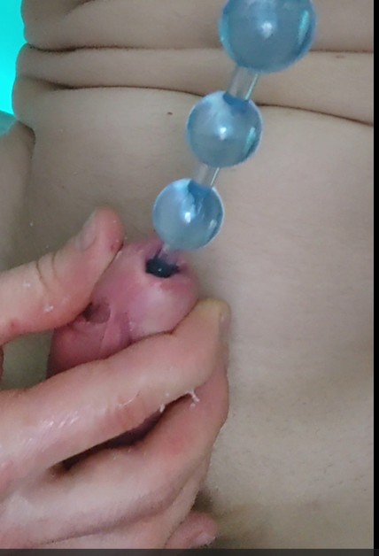 Anal beads in my cock