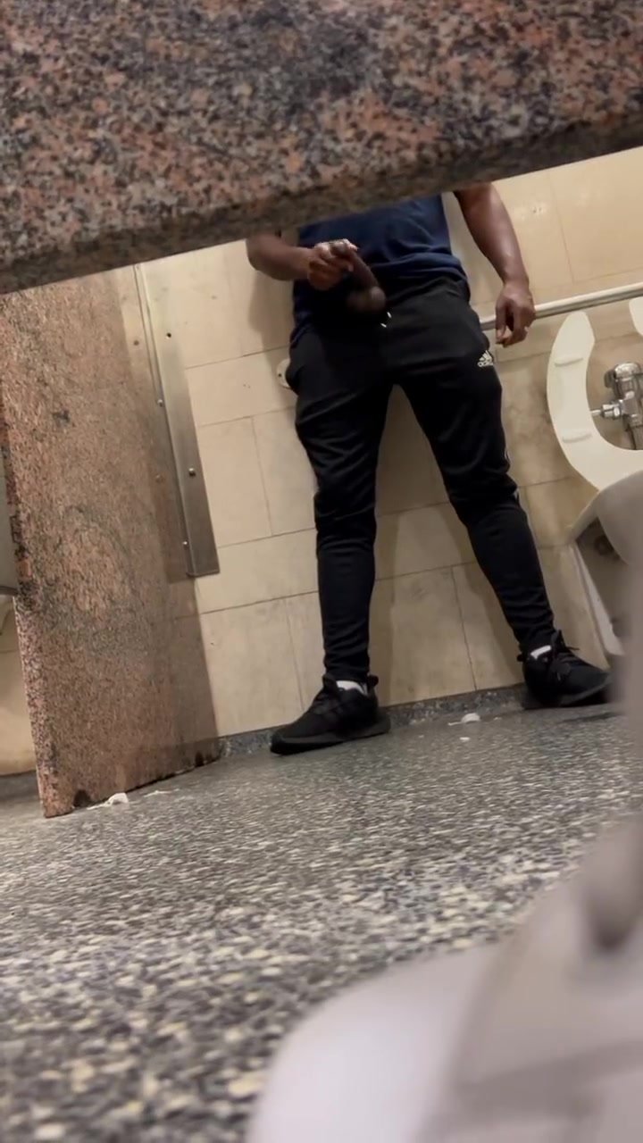 Thick Uncut BBC Caught Stroking in Public Stall
