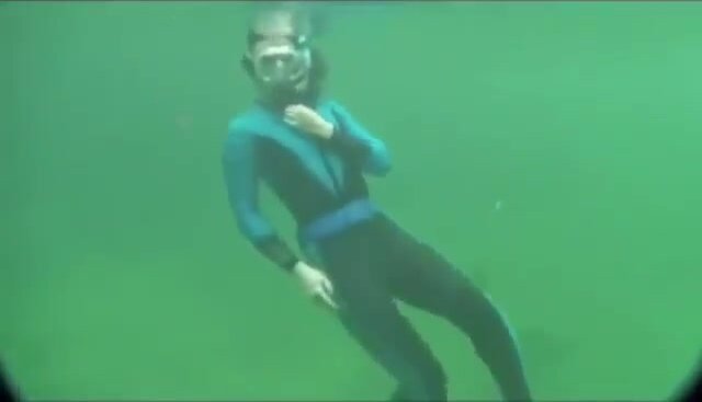 Snorkel wetsuit woman masturbation in sea