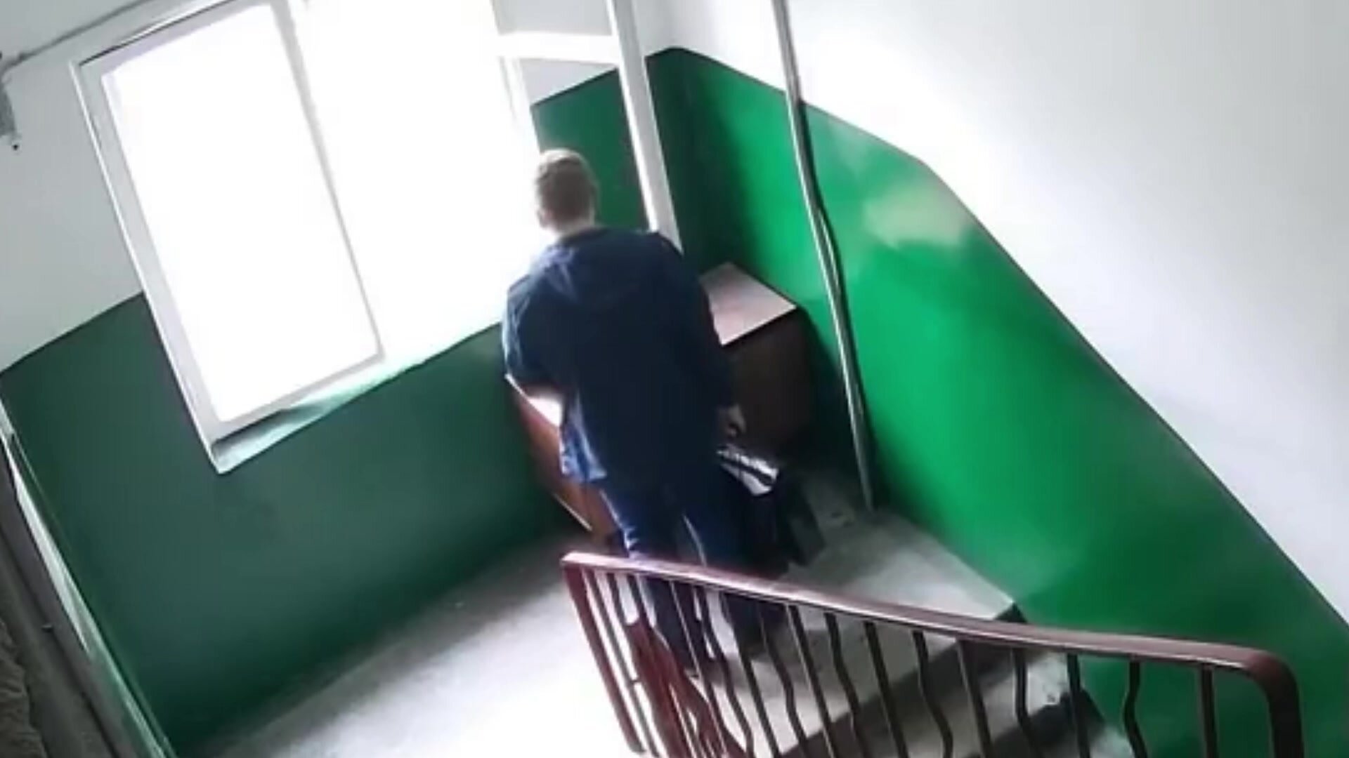 Nasty guy pisses in closet on stairwell CCTV
