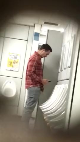 SPYING MEN PISSING AT URINAL - video 2