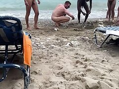 Naked guys at the beach
