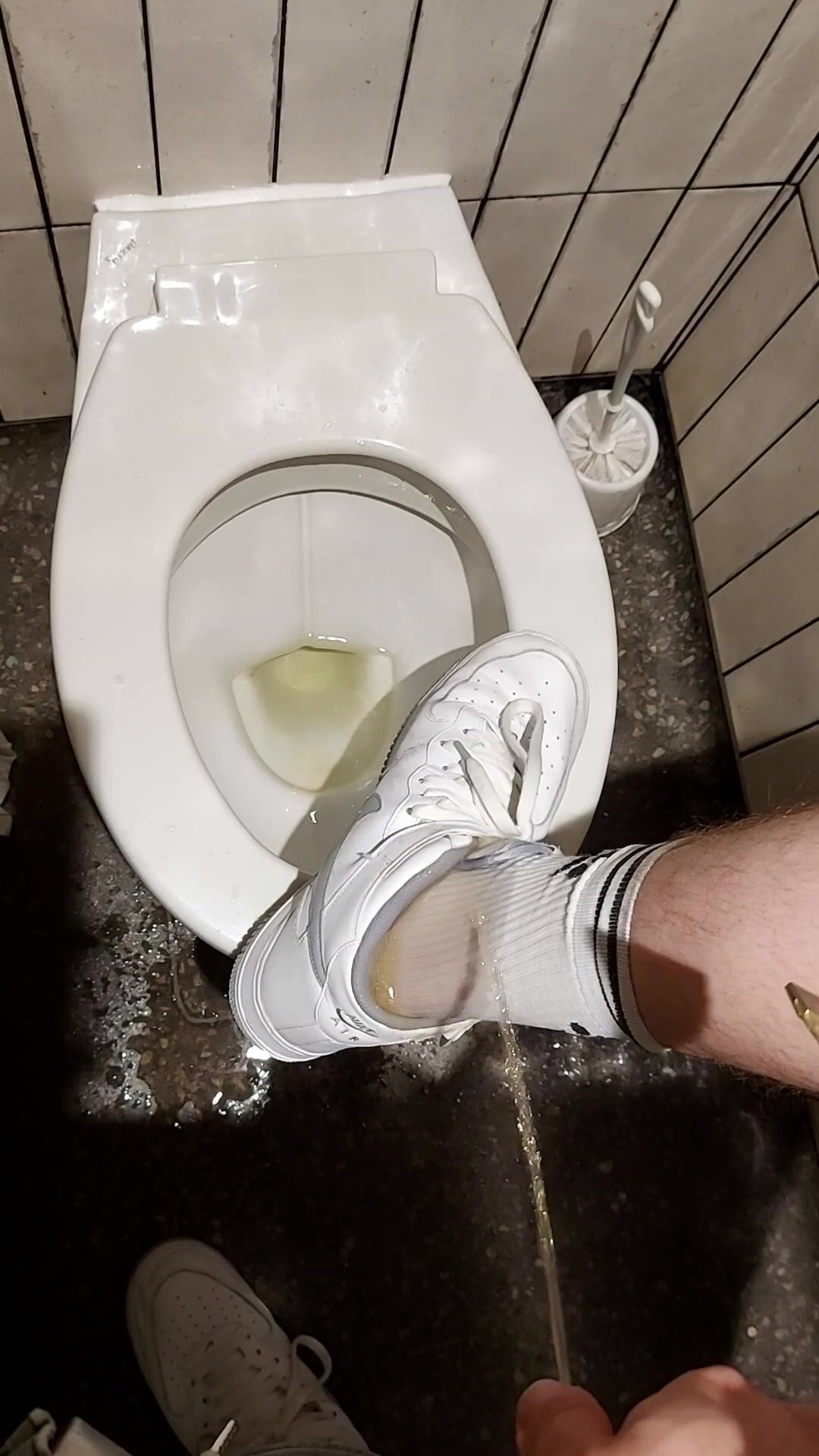 Socks and sneaks piss in public bathroom