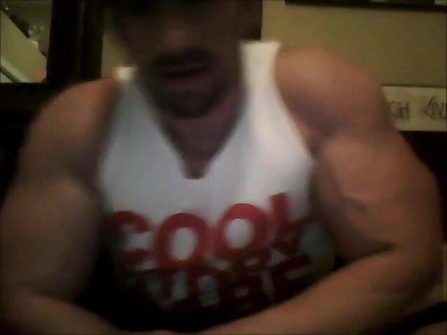 Cocky verbal alpha spitting in a cup and flexes muscles