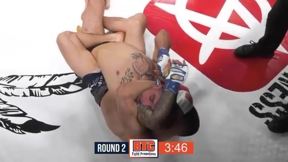 mma rear arm triangle submission knocked out
