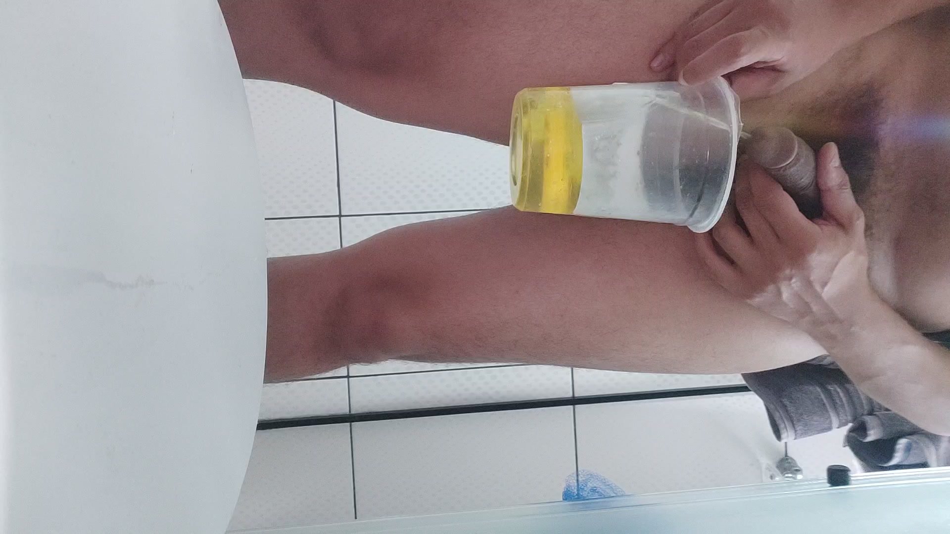 Pissing in the cup - video 3