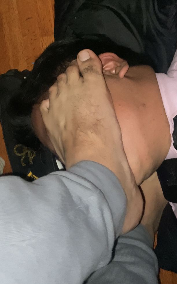 Slapping his face with my big feet