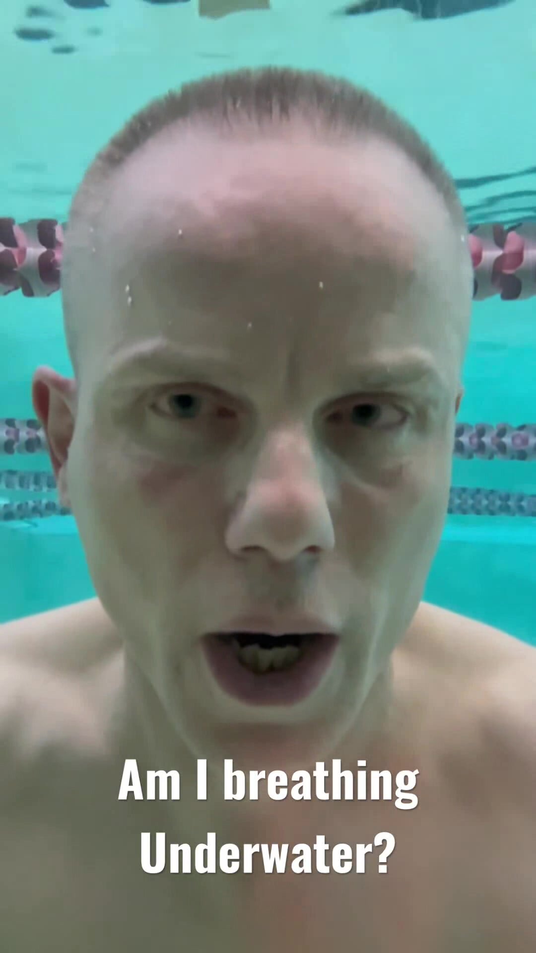 Breatholding barefaced underwater in pool - video 4