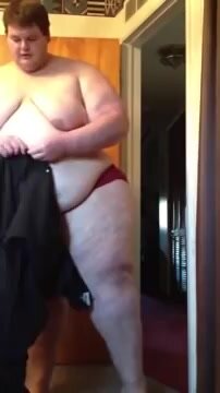 Chub with fat ass is getting dressed