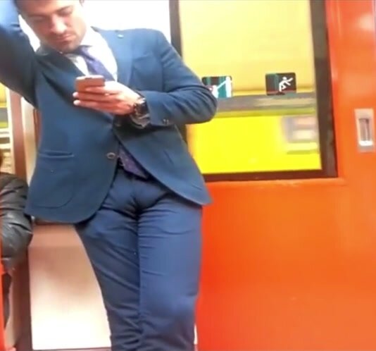 Suited alpha shows off his bulge on subway