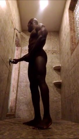 Black muscle stud nuts in shower
