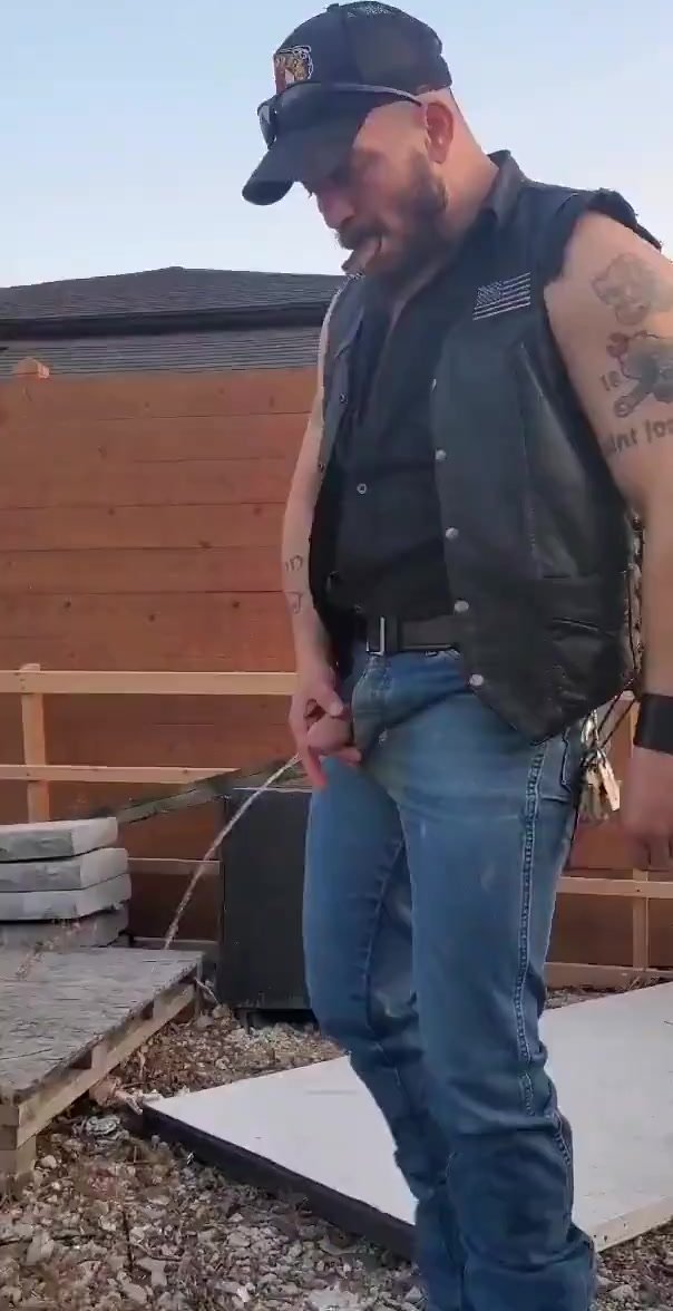 Smoking cigar  pissing hot biker