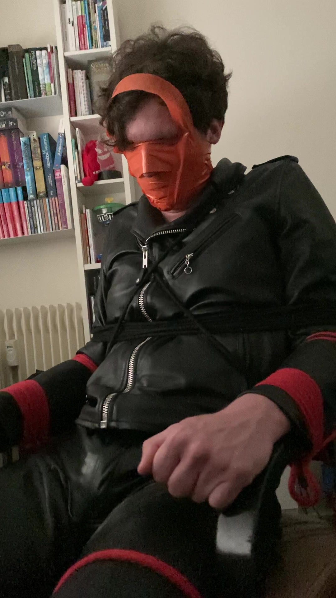 Young lad tied  in leather