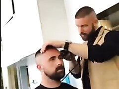 Barber bear gives bear same haircut