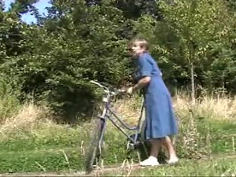 German lady relieves herself in nature..