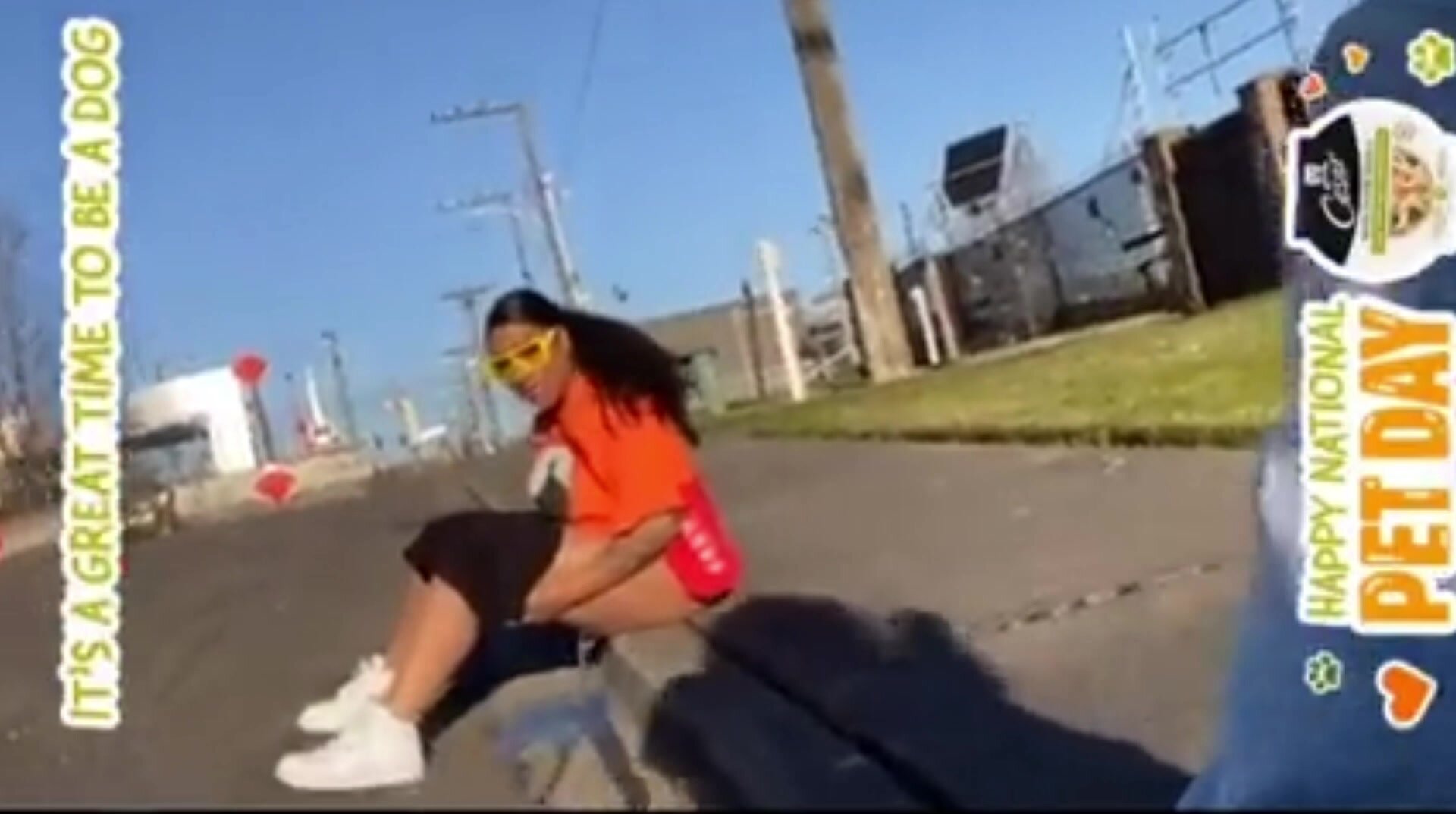 Girl pees sitting on curb