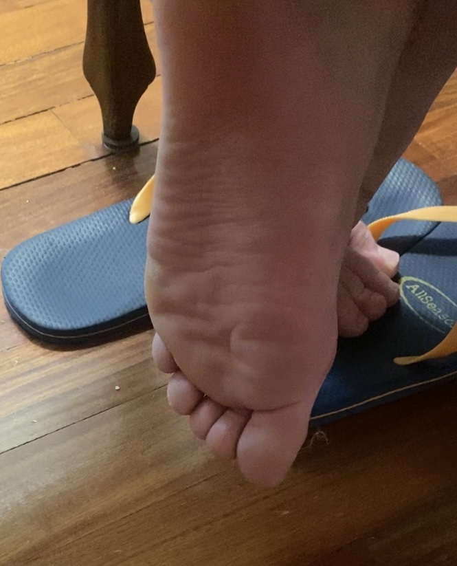 Boy candid feet barefoot,shoeplay while eating