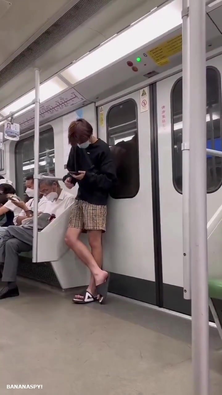 Boy grabbing his boner in public subway