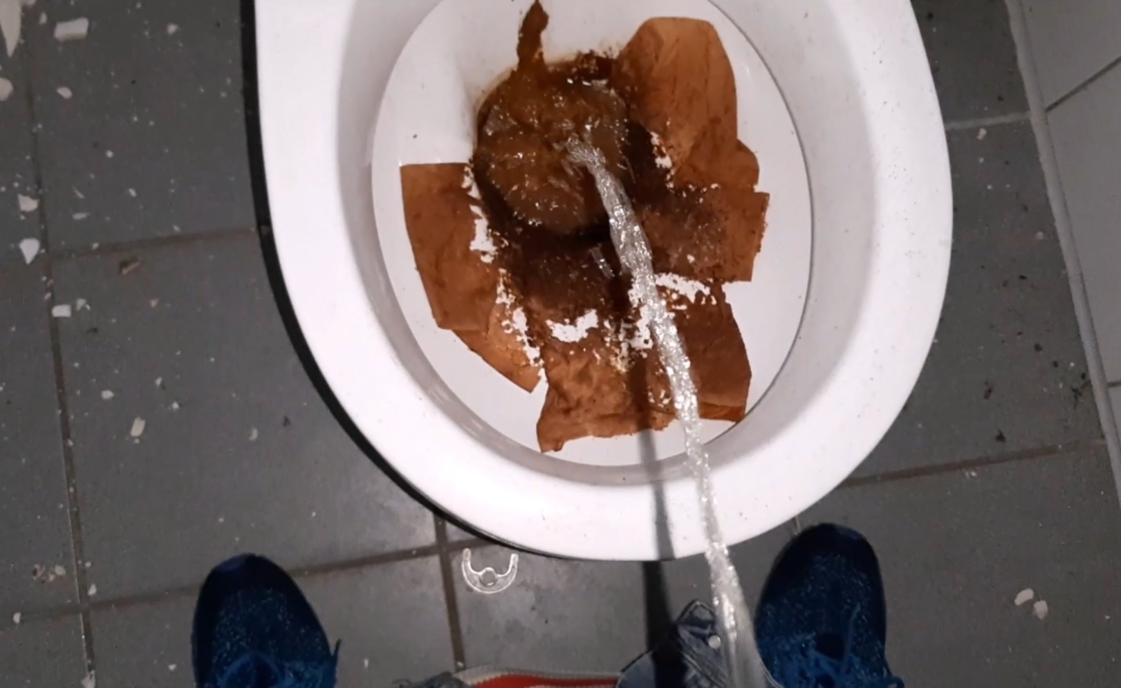 boy shit and piss in toilet in abandoned building