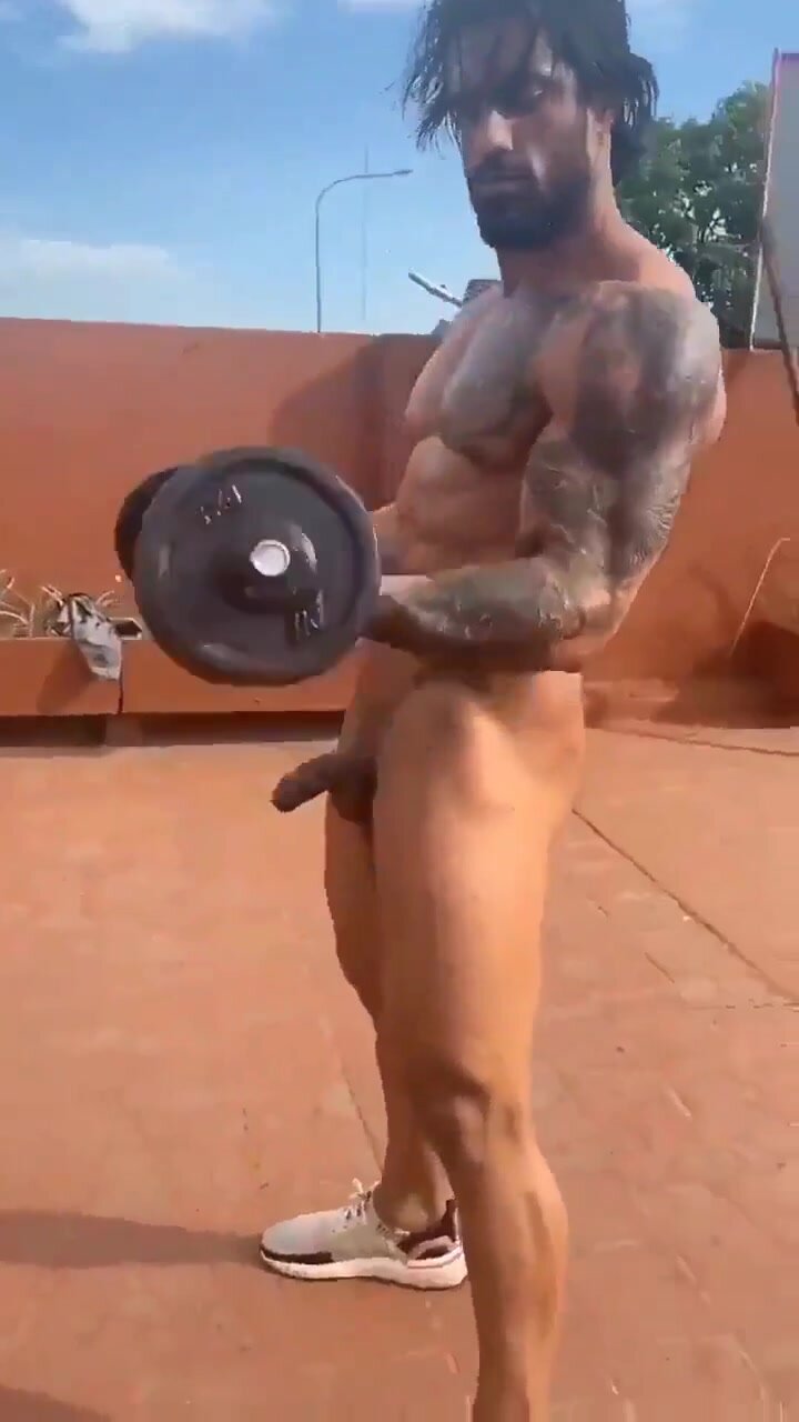 Bodybuilders working out naked